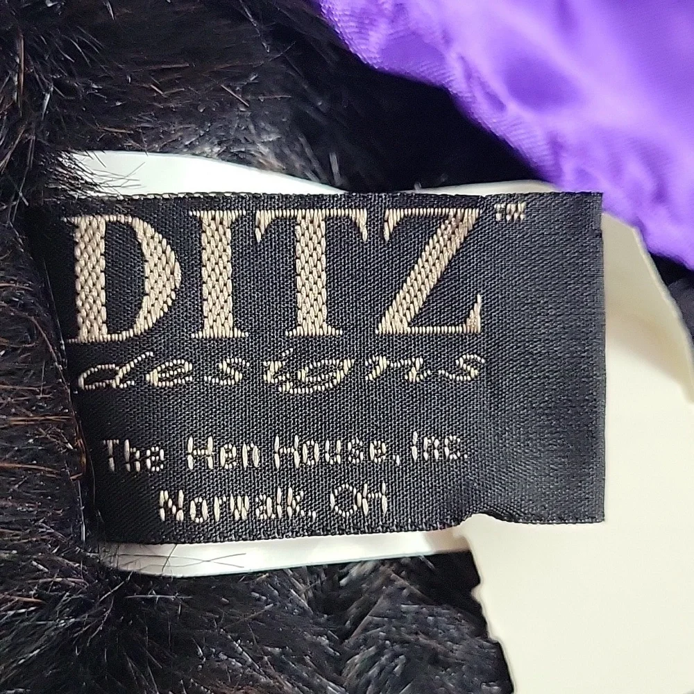 Bronner's Ditz Design Plush Bear wearing pearls and purple dress